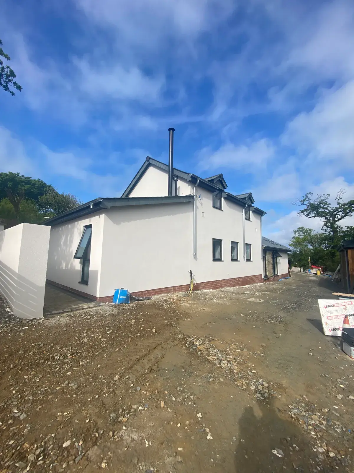 Bungalow finished in smooth white silicone render, by PureRend