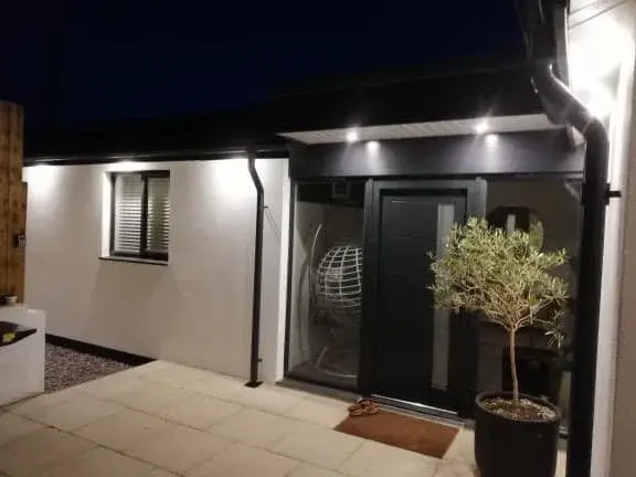Rendered contemporary home lit at dusk, by PureRend